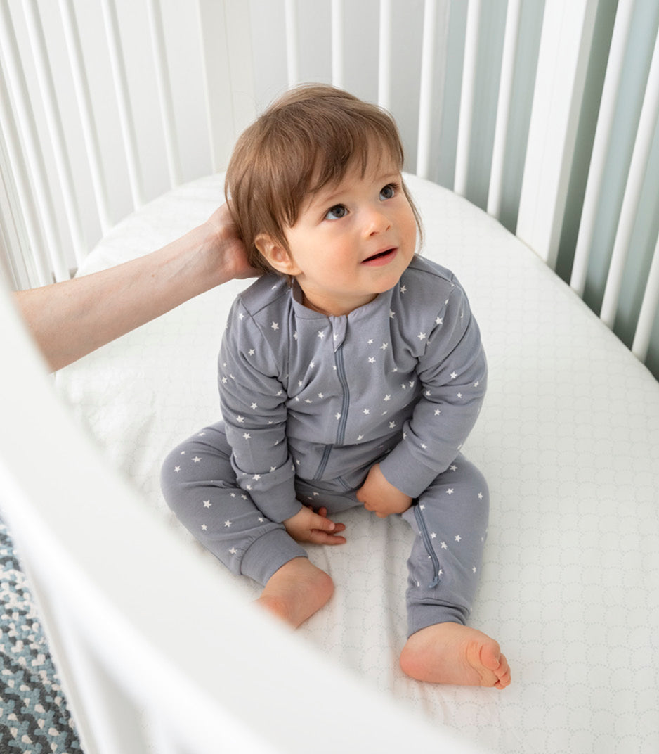 سرير ستوكي سليبي باللون الأبيض